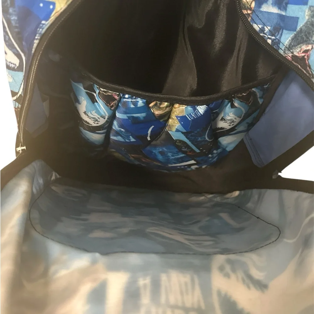 Jurassic World  life finds away backpack Print Backpack with Blue Accents